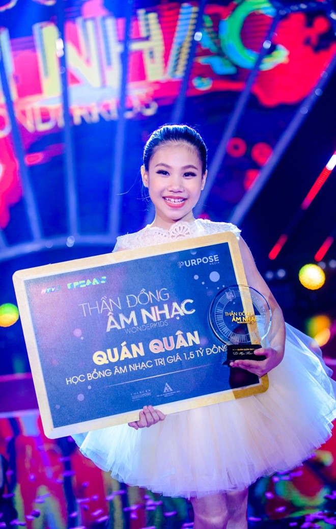 Be 9 tuoi nhan giai thuong 1,5 ty cua Than dong am nhac-Hinh-2